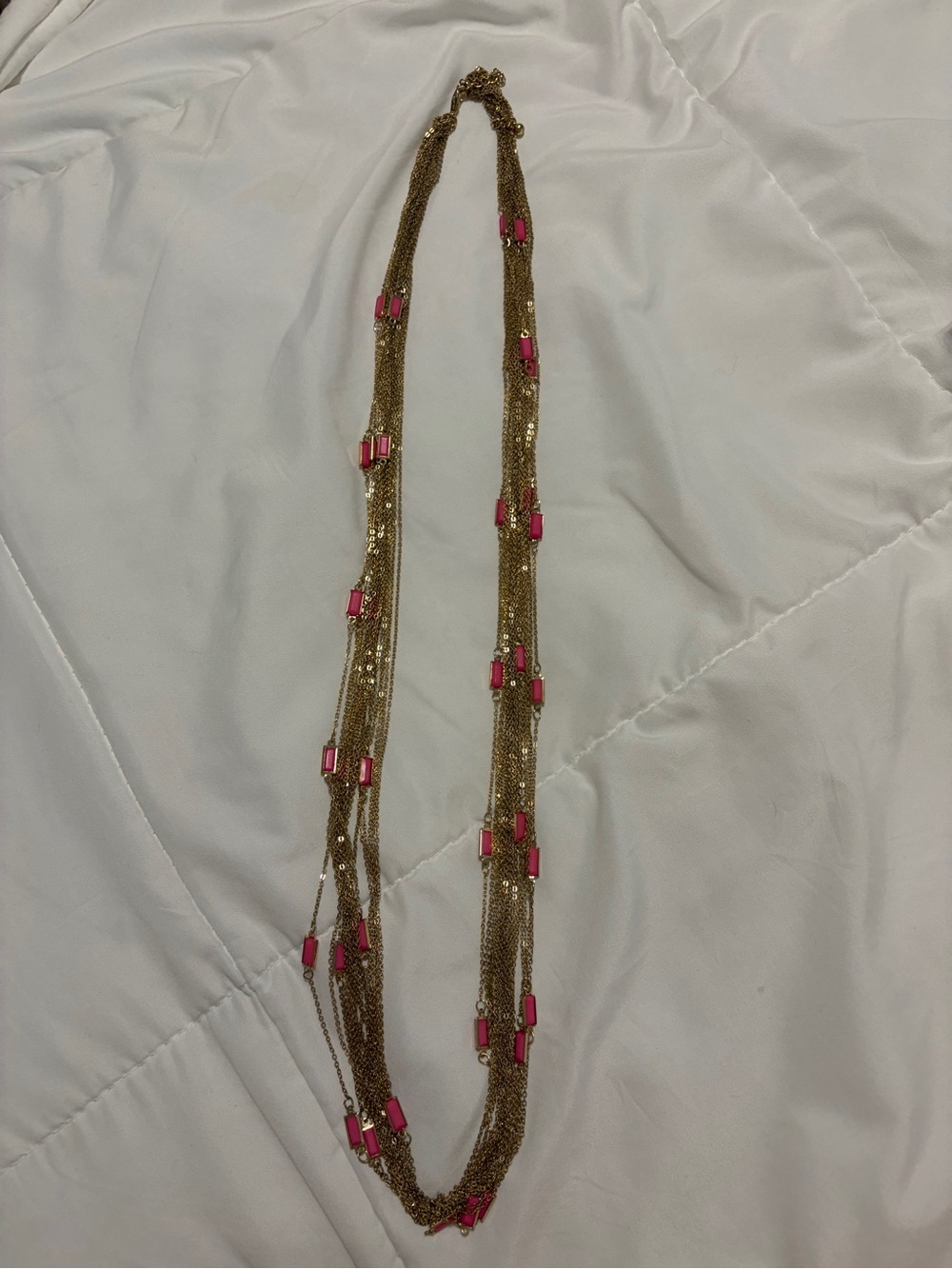 Gold Multi-Strand Necklace with Pink Bead Accents